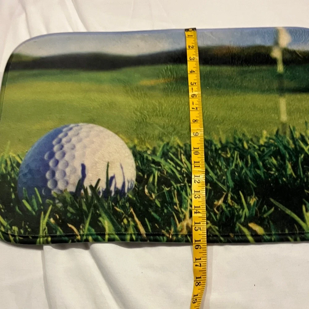 Golf Ball and Green Grass Mat
